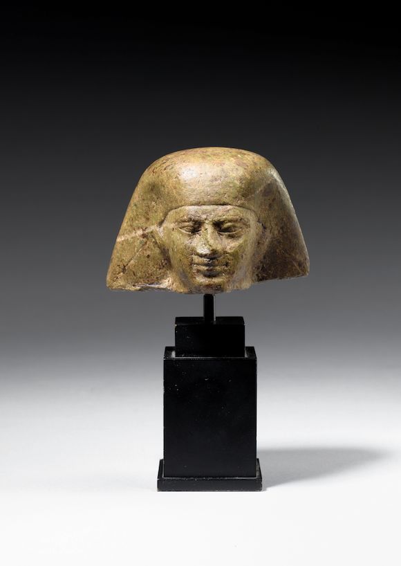 Bonhams An Egyptian Green Periodite Head bonhams-an-egyptian-green-periodite-head
