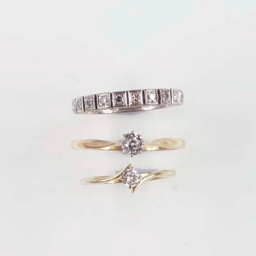 A single stone diamond ring, (3)