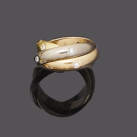 A diamond trinity ring, by Cartier