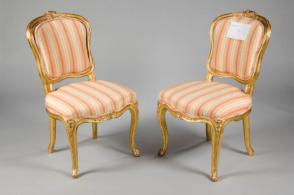 Bonhams : A pair of mid 19th century carved gilt side chairs