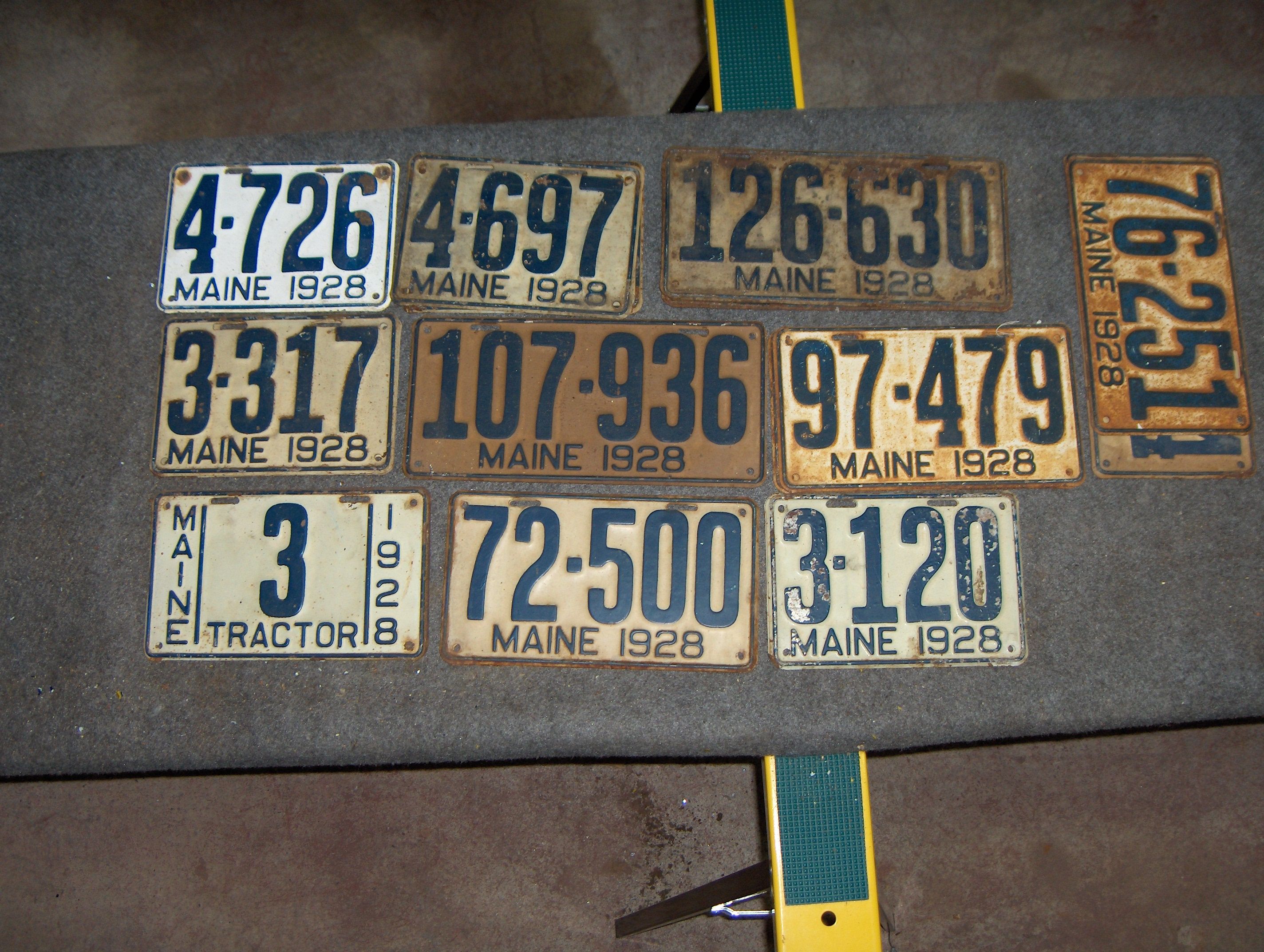 Bonhams Cars : Twenty assorted 1928 embossed tin Maine license plates,,