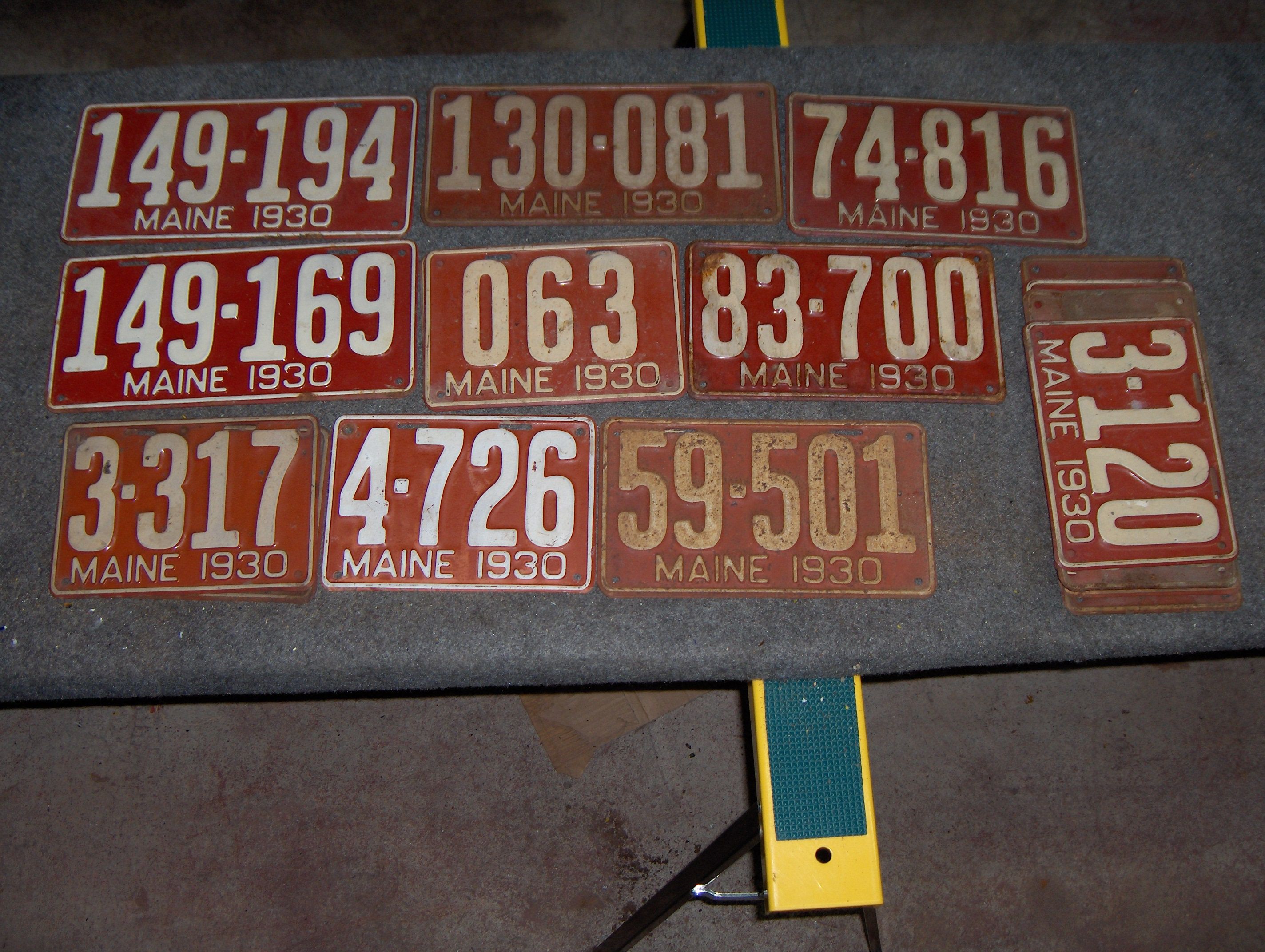Bonhams Cars : Twenty-six assorted 1930 embossed tin Maine license plates,,