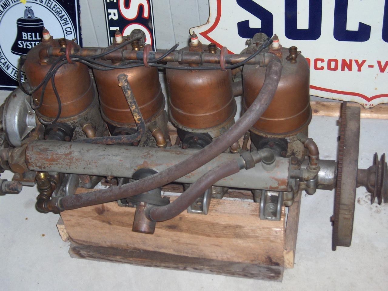 Bonhams Cars : A veteran 4 cylinder marine inboard 2 cycle engine,