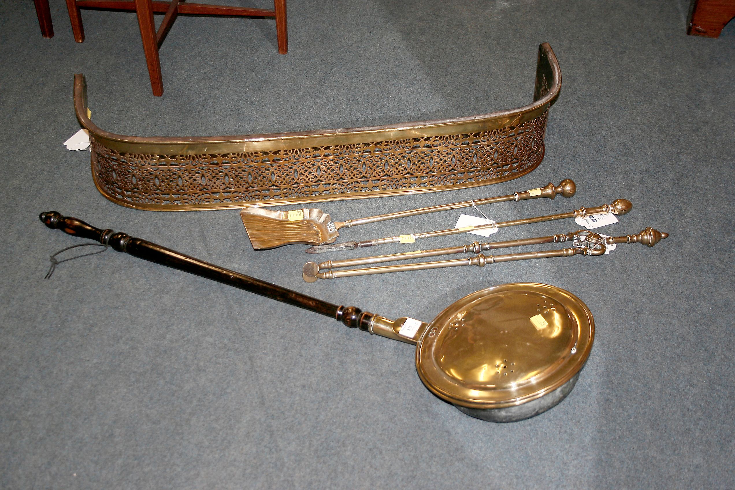 A brass warming pan