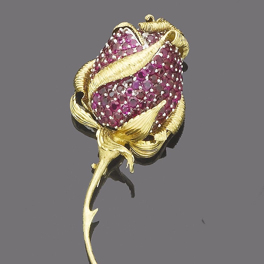 A ruby flower brooch, by Kutchinsky,