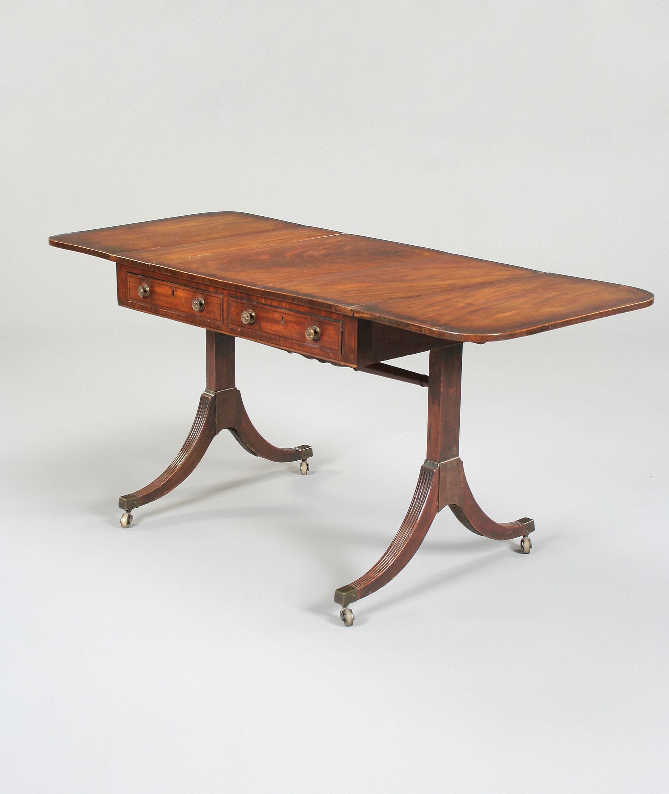 A Regency mahogany sofa table