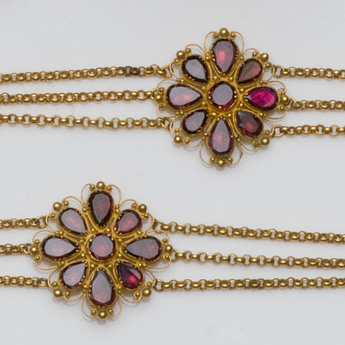 A pair of garnet set bracelets