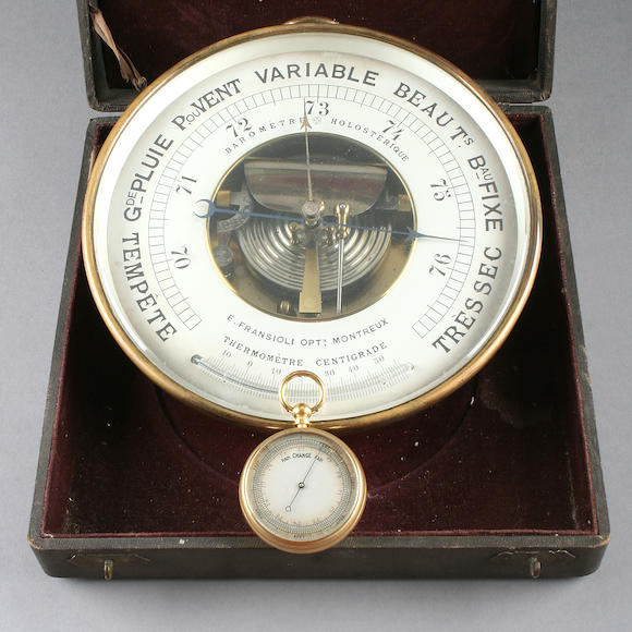 Bonhams : A Swiss brass-cased aneroid barometre holosterique 