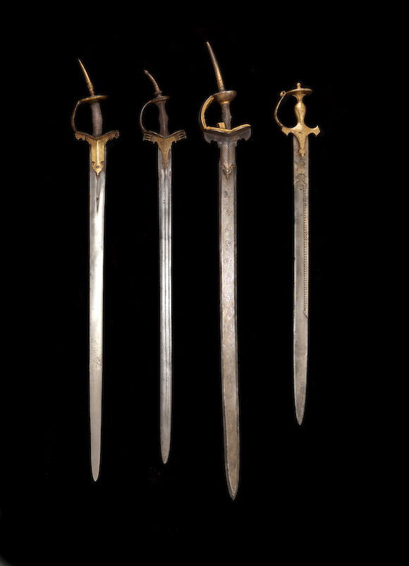 Bonhams : A gold koftgari-hilted steel Sword India, 19th Century
