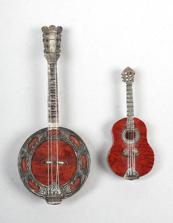 Bonhams : Two novelty miniature stringed musical instruments with white ...