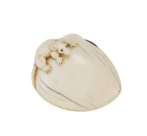 Bonhams : An ivory netsuke carved as a rat on a shell Inscribed Gyokuryusai
