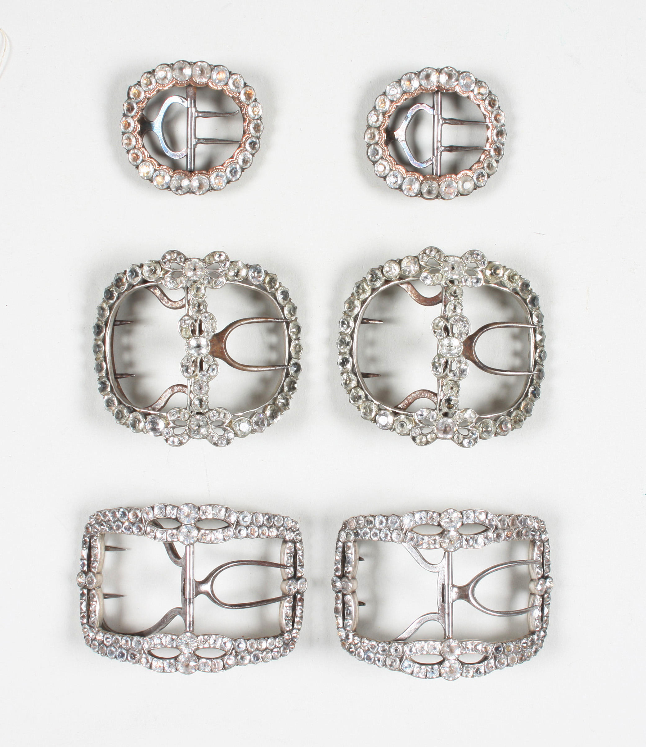 Three pairs of George III metal buckles