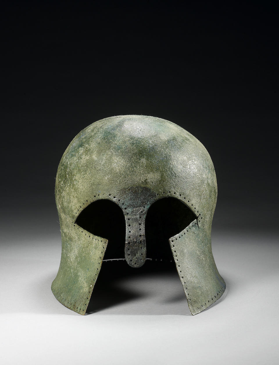 Bonhams : A Corinthian type bronze helmet