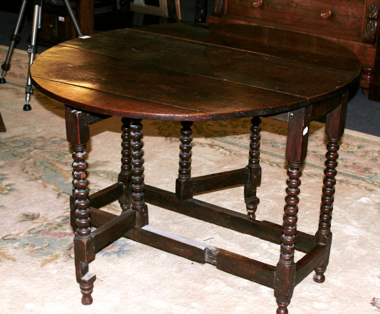 An oak gateleg table