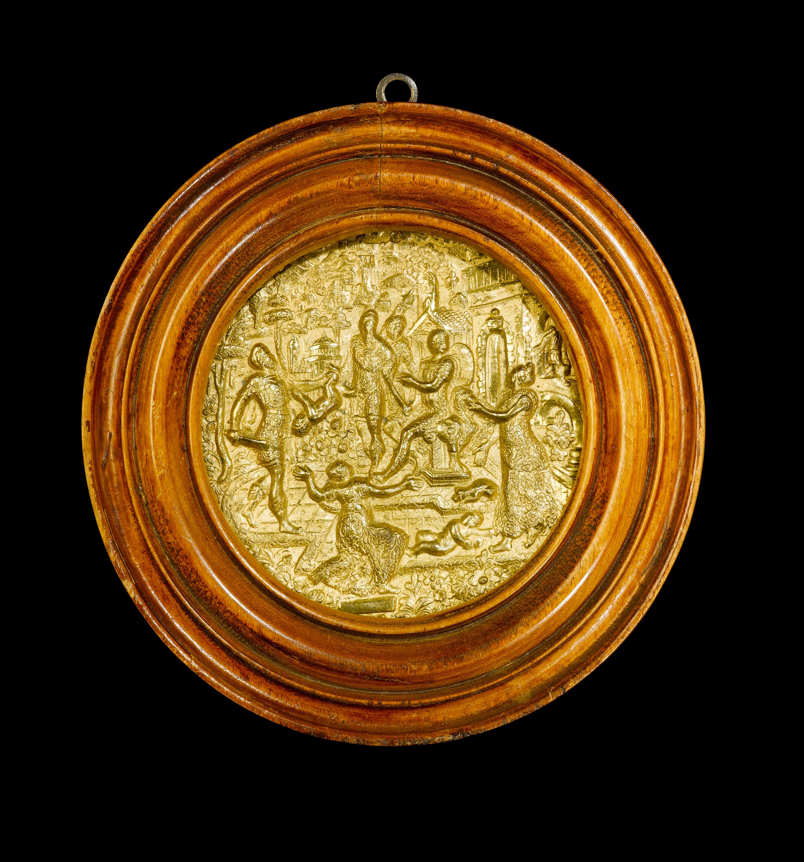 A 17th century German gilt bronze circular plaque depicting the