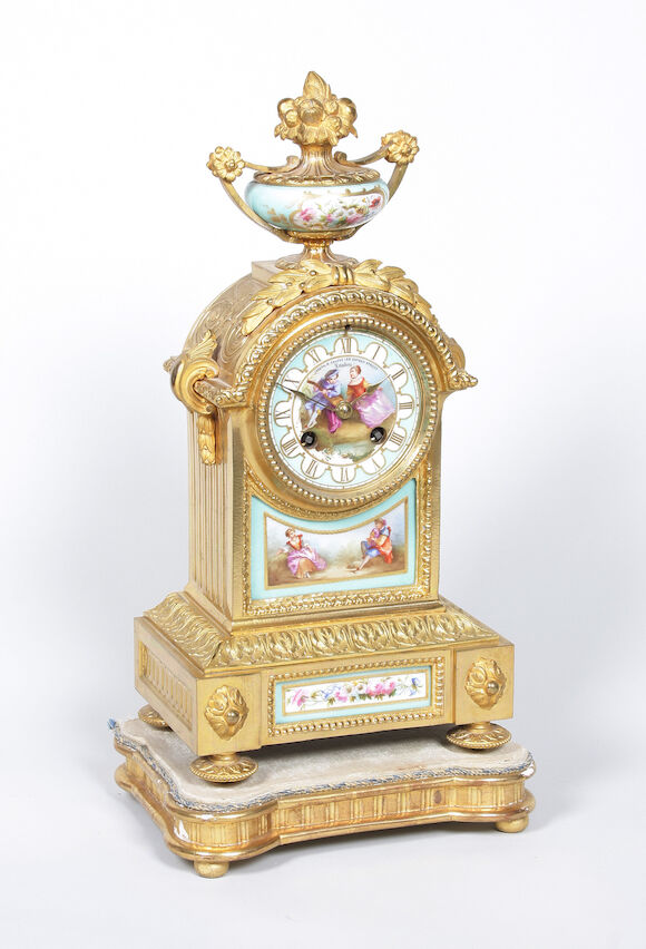 Bonhams : A 19th century French gilt brass and porcelain mantel clock