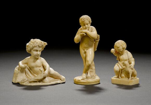 Bonhams : A 19th century Dieppe carved ivory figure of a boy with a dog