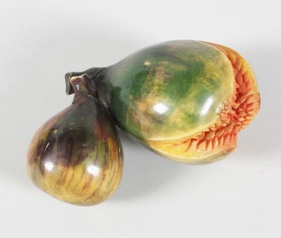 Bonhams : A Japanese stained ivory carving of two fruit Meiji period.