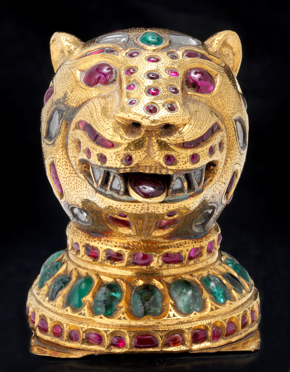 An important gem-set gold Finial in the form of a Tiger's Head from the throne of Tipu Sultan (1750-99) Mysore (Seringapatam), made between 1787-93