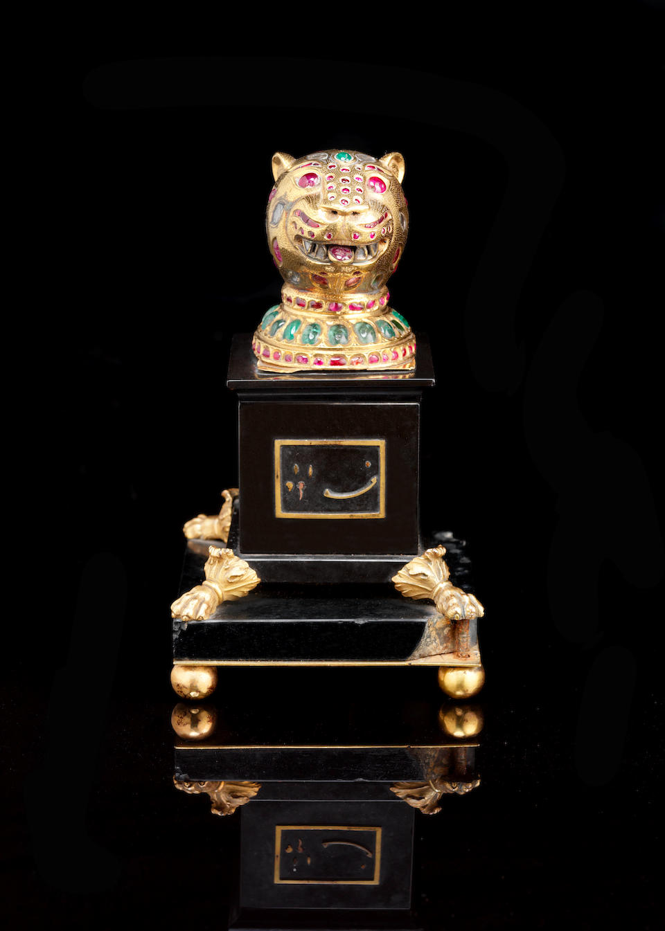 An important gem-set gold Finial in the form of a Tiger's Head from the throne of Tipu Sultan (1750-99) Mysore (Seringapatam), made between 1787-93