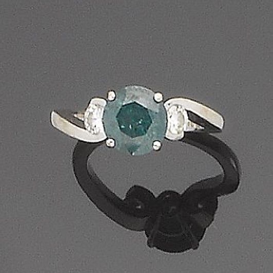 A treated diamond single-stone ring