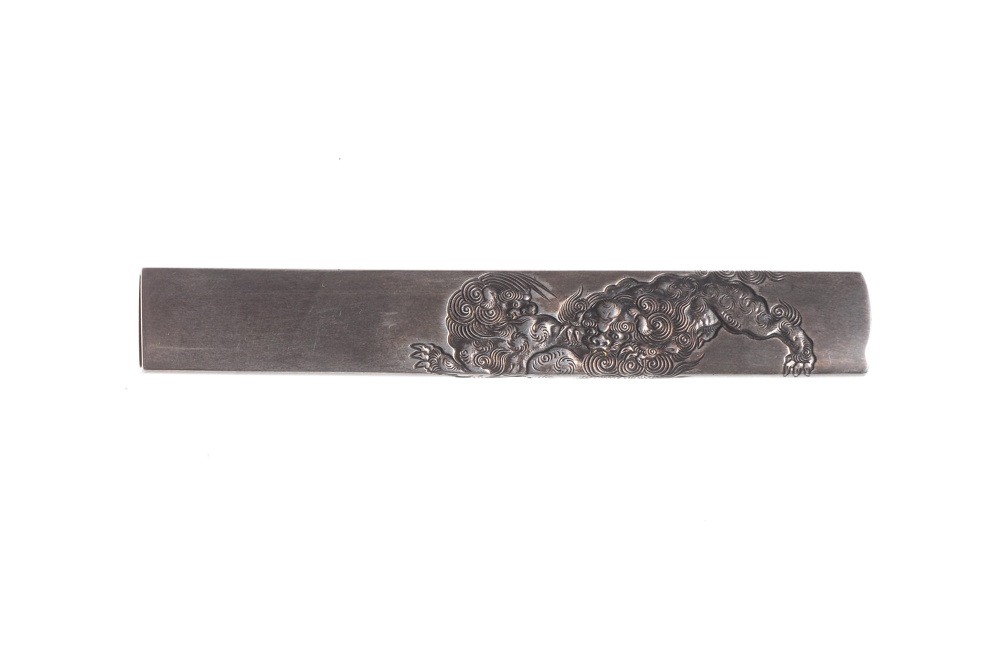 A silver kozuka