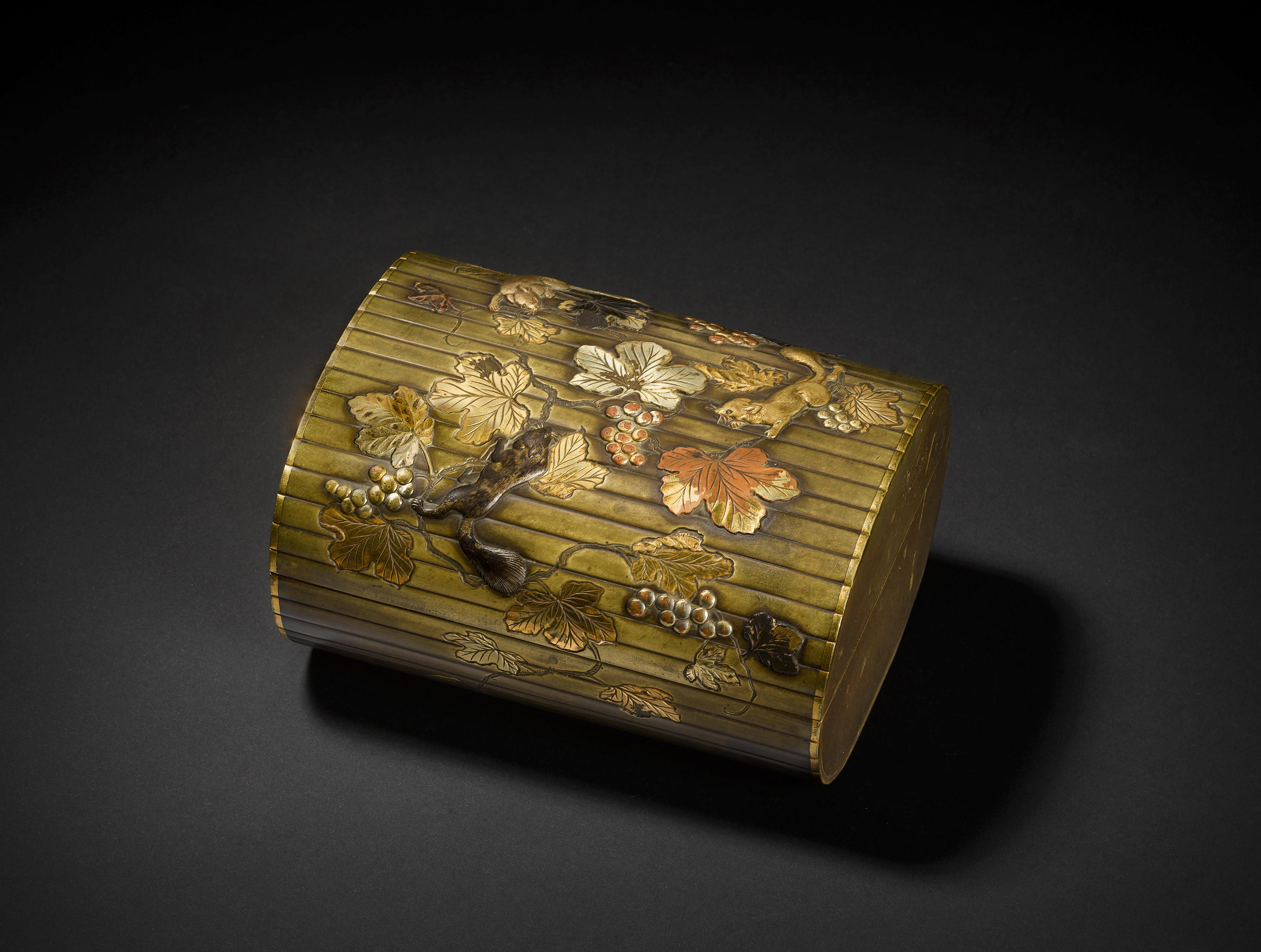 An inlaid bronze box and cover