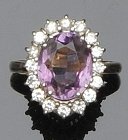 An amethyst diamond ring