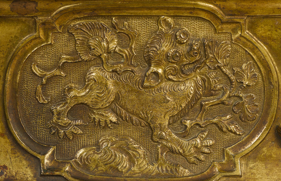 A rare ormolu-mounted Kakiemon model of a seated bijin The figure Japanese, Edo Period, circa 1670-1680, the ormolu mount French, probably Transitional-Louis XVI, circa 1760-1770, the plaque Chinese Kangxi, early 18th century