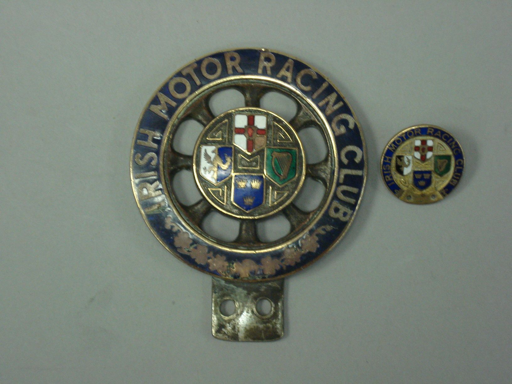 Bonhams Cars : An Irish Motor Racing Club car badge and lapel,
