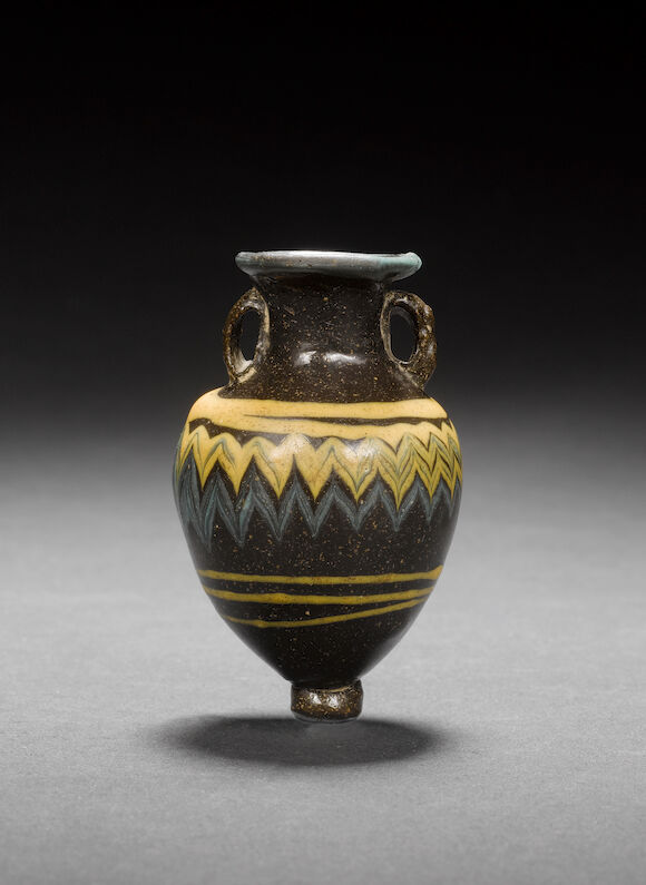 Bonhams : A Greek core-formed glass amphoriskos