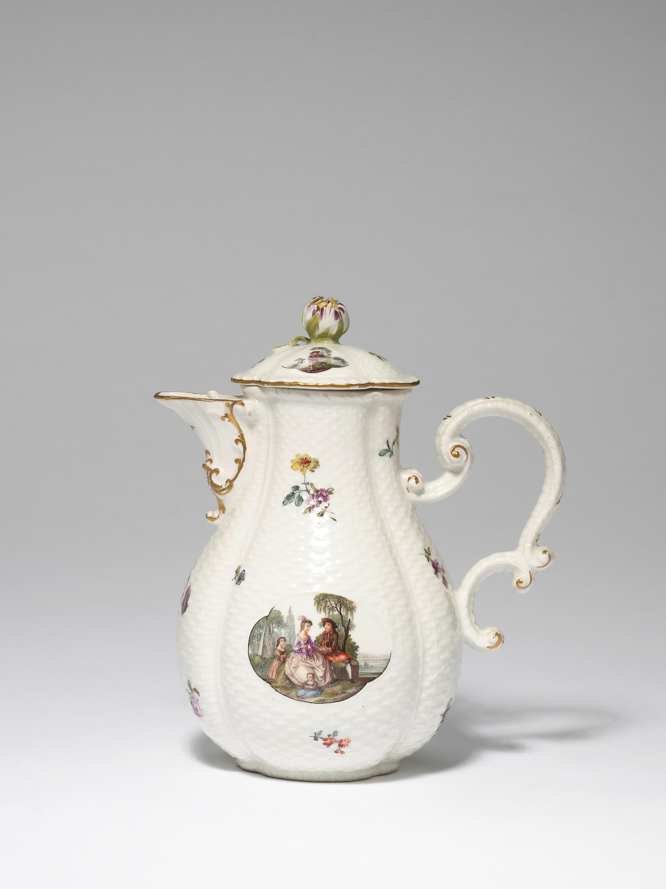 An attractive Meissen moulded jug and cover
