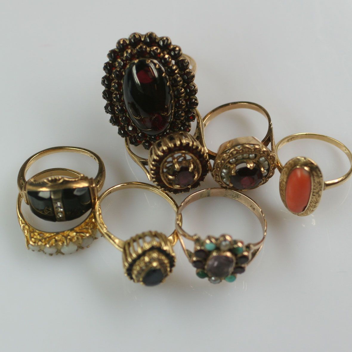 Eight gem set rings.