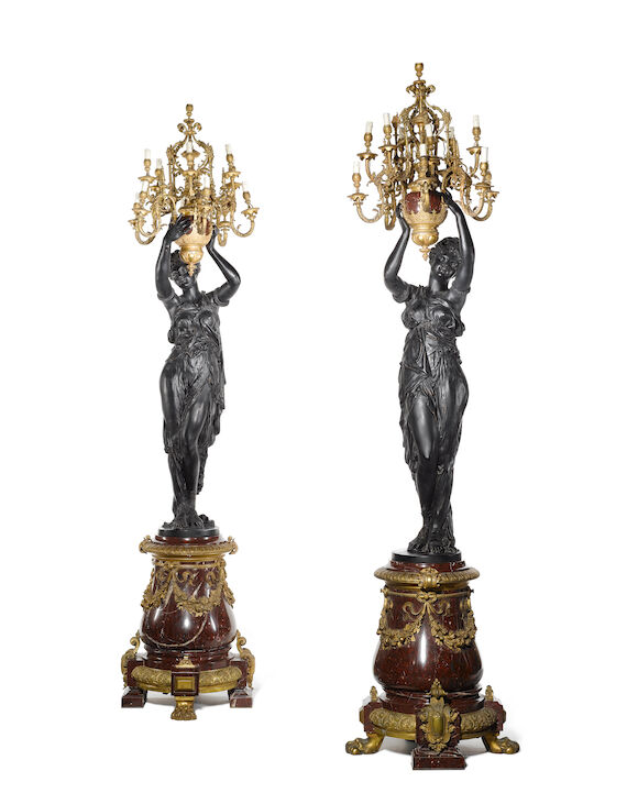 Bonhams : A large pair of French early 20th century gilt and patinated ...