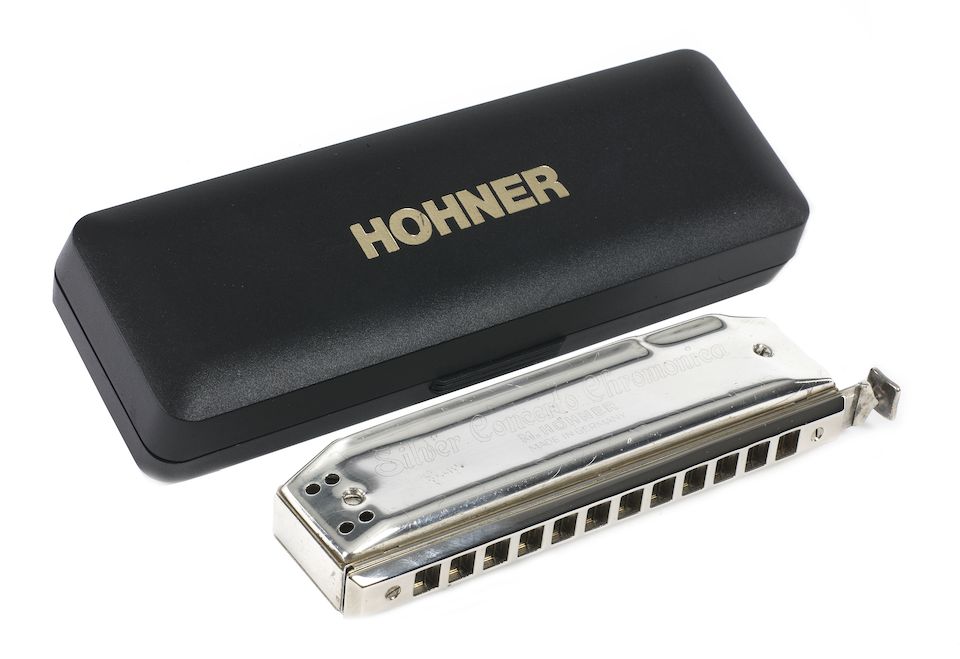 Bonhams Larry Adler's silver concerto harmonica,