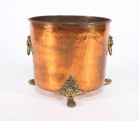 Bonhams A hammered copper log bin