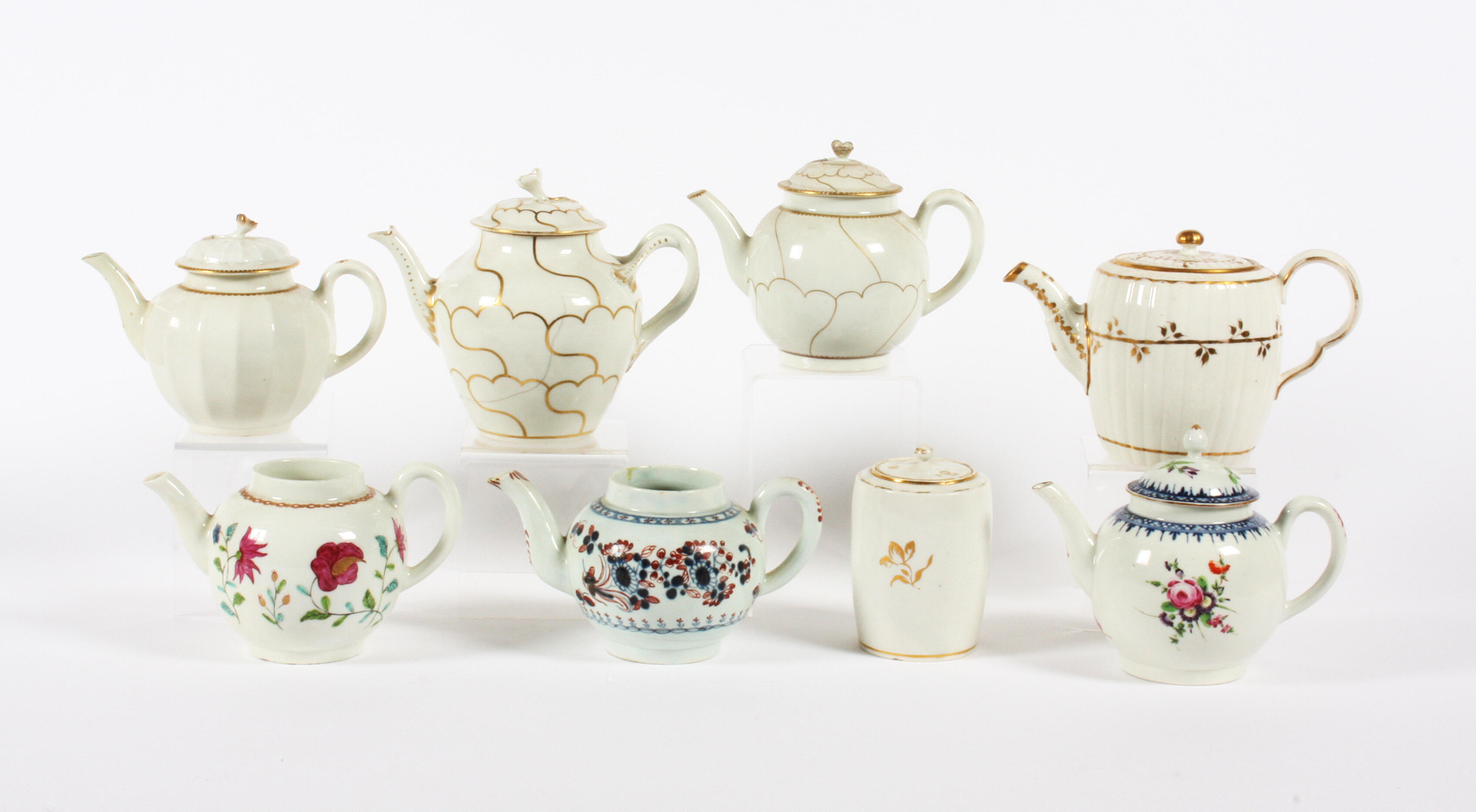 Bonhams Four Worcester teapots and covers, an odd teapot, a tea