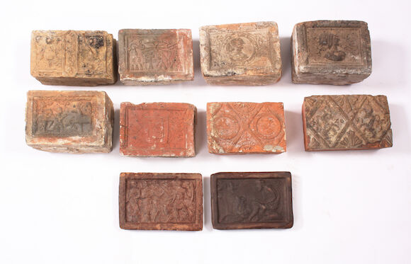 Bonhams : A collection of ten Dutch fire back tiles 16th and 17th Century.