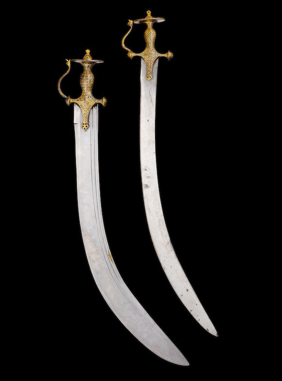 Bonhams : A koftgari-hilted steel Sword (tulwar) India, 19th Century