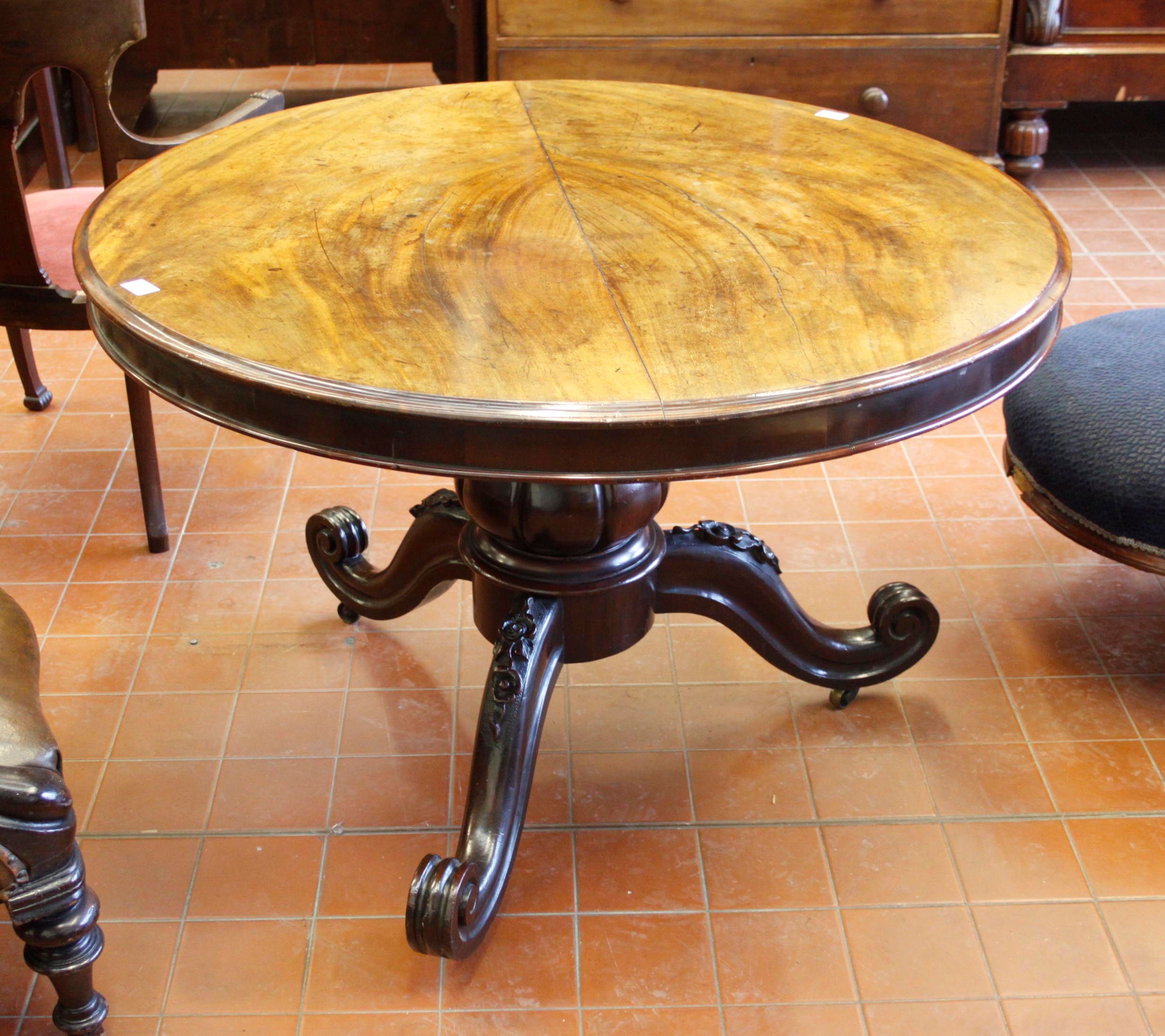 A mid Victorian walnut breakfast table