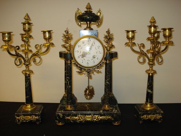 Bonhams : A late 19th Century French marble and gilt metal clock garniture,