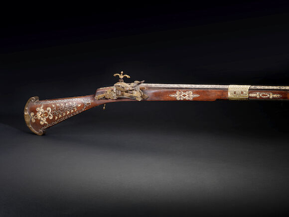 Bonhams : An Ottoman ivory inlaid flintlock Rifle, signed Ahmed North ...