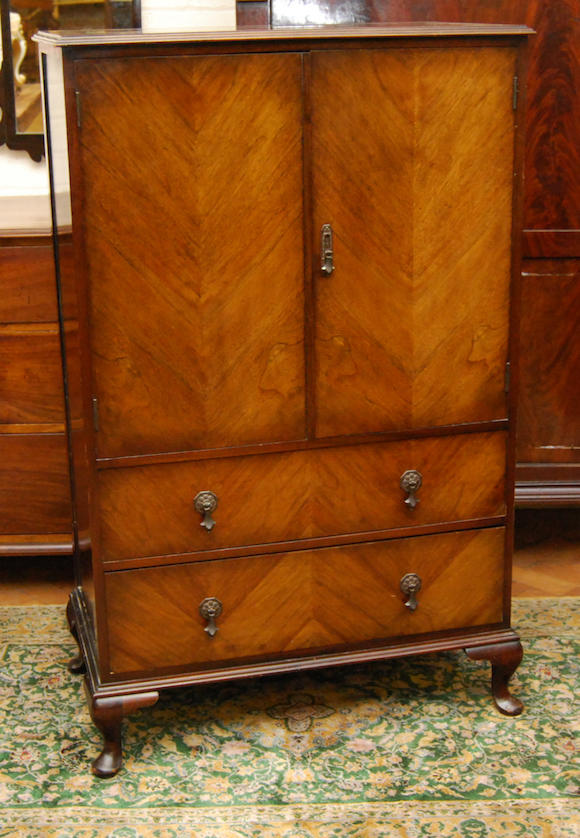 Bonhams : A 1930s Waring and Gillow walnut cocktail cabinet Bearing ...