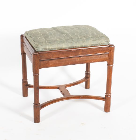Bonhams A Gordon Russell walnut dressing stool designed by Gordon