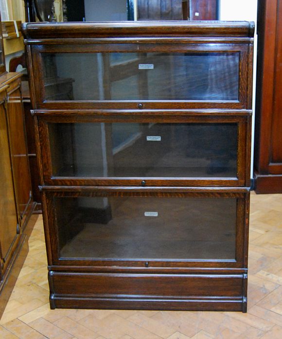 Bonhams A Globe Wernicke oak stacking bookcase, early 20th Century