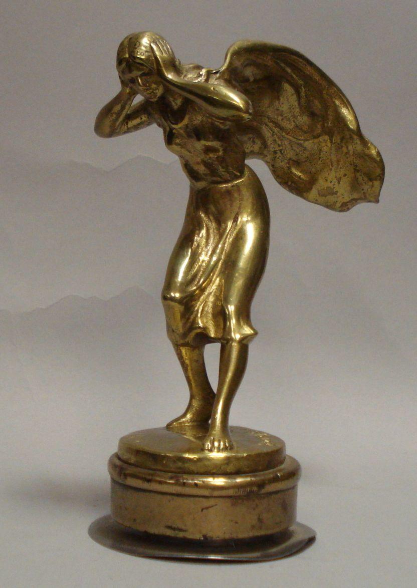 Bonhams Cars : A 'Windswept' mascot by H. Recordfee, French, 1920s,