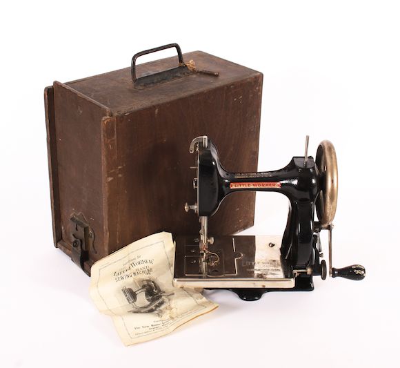 Bonhams A portable hand sewing machine 'The Little Worker' by The New
