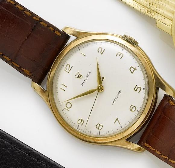 Bonhams : Rolex. An 9ct gold manual wind wristwatchPrecision ...