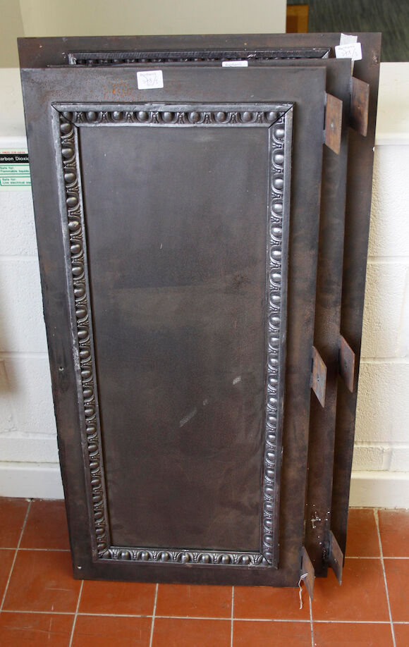 Bonhams : Three 20th Century rectangular cast iron fire panels,