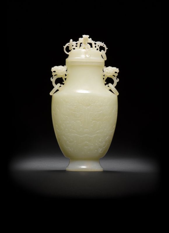 Bonhams A fine white jade 'dragon' vase and cover 18th/19th century